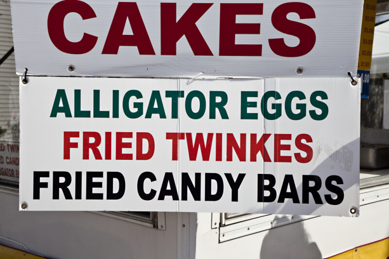 Sign for Cakes, Alligator Eggs, Fried Twinkies, & Fried Candy Bars