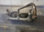 Sink Faucet in a Painting Studio