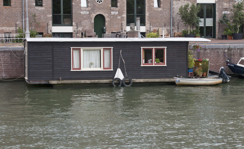 Small Houseboat on a Canal in Amsterdam
