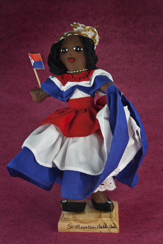 St. Maarten Handcrafted Female Doll Holding Flag for Dutch Sint Maarten (Full View)