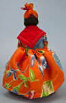 US Virgin Islands, St. Thomas Female DollWearing Tropical Dress with Shawl and Head Tie (Back View)
