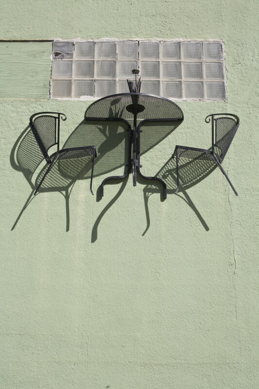 Table and Chair on Wall