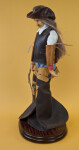 Wyoming Male Cowboy Figurine with Rope Lariat and Saddle (Profile View)
