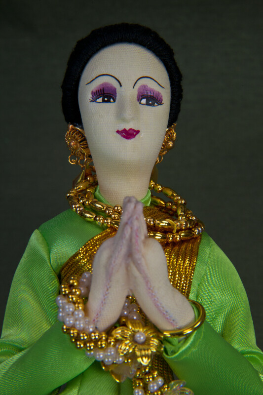 Thailand Fabric Thai Doll Wearing Traditional Gold Jewelry (Close Up)