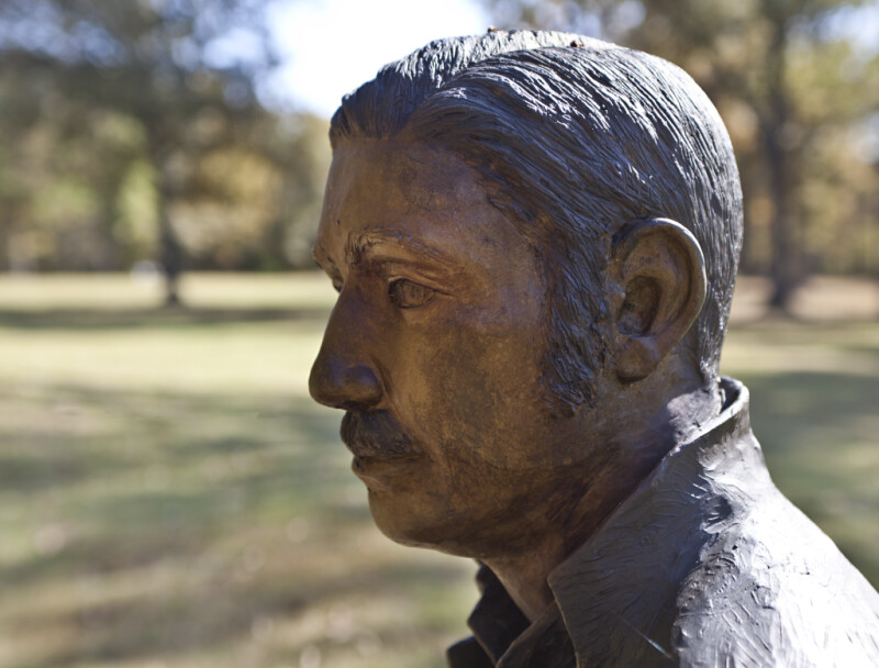 The Face of a Bronze Figure Representing Chaplain Alexander
