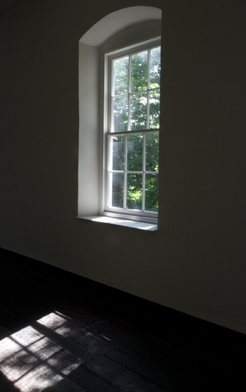 The Sunlight Through the Sash Window