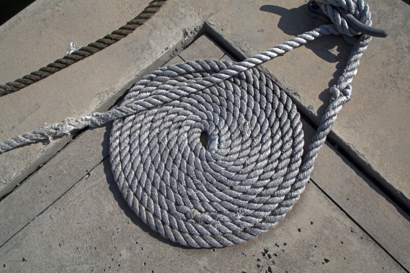 Thick Rope Tied to a Dock Cleat