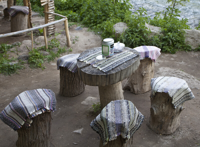 Tree Stump Chairs Around a Circular Wooden Table in the Ihlara Valley of Turkey