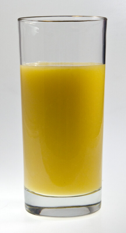 Tumbler of Orange Juice Three-Quarters Full