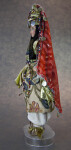 Turkey Woman in Traditional Dress Adorned with Coins and Beads (Profile View)