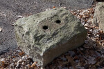 Two Bore Holes in a Stone Block