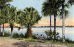 Two People Enjoy the Sunset on the Halifax River, Daytona, Florida