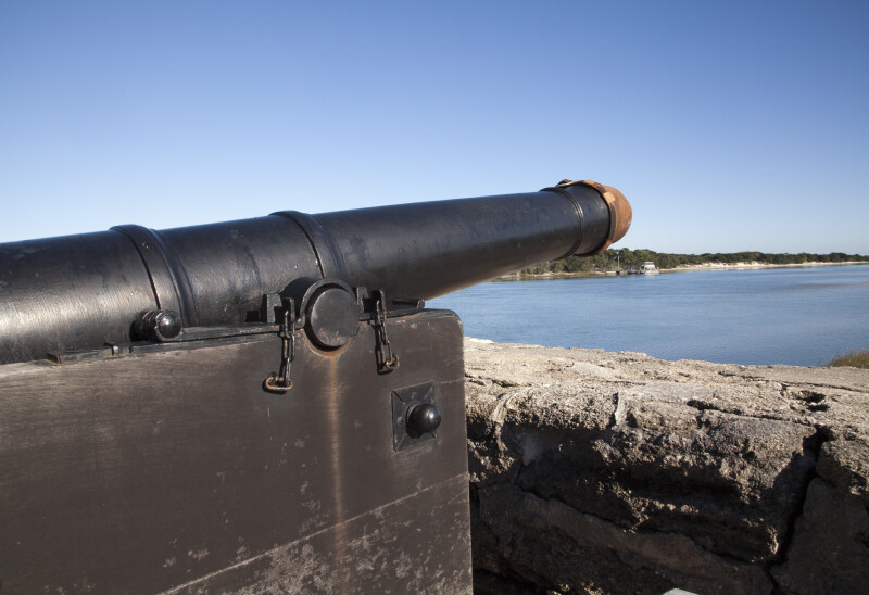 View of a Cannon  with Leather Cover Strapped Over the Opening of the Barrel