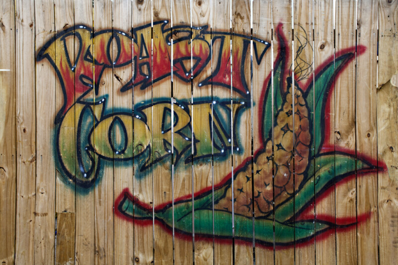 Wooden Fence with Picture of Roasted Corn