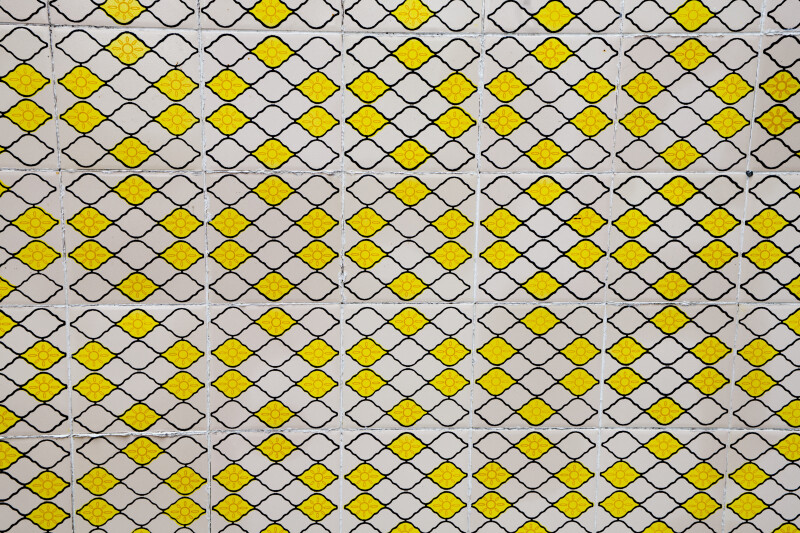 Yellow and White Tiled Wall