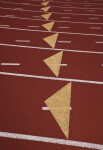 Yellow Triangles in White Lines of Running Track