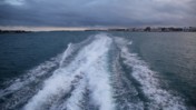 A Motorboat Trailing Wake