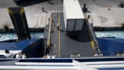 Vehicles Boarding the Ferry